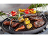 Twin grill warming rack with grilled vegetables, steak, chicken, and corn on barbecue